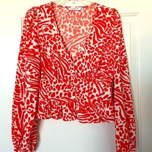 Long sleeved patterned blouse